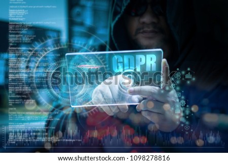Hacker using clear tablet with HUD panel and code graph bar data analytsis element for cyber technology concept, dark and grain process, shallow depth of field select focus on hands