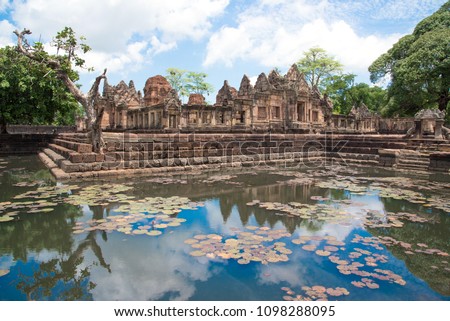 The public place is PRASAT MUANG TAM is historic and ancient castle of generality in Buriram province Thailand and a kind of Khmer architect art decorated in the Buddhist temple,pavilion,temple hall Royalty-Free Stock Photo #1098288095