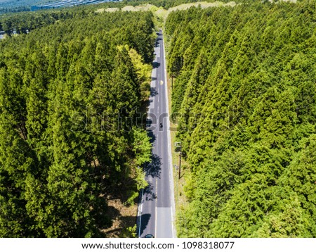 Aerial photograph of a straight road in the mountain.