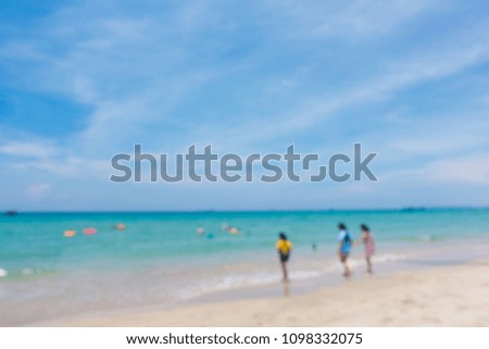 Children playing on the beach in vacation. Children playing with friend on sand and beach in summer weather. The subject and background out of focus
