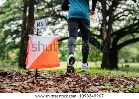 Outdoor orienteering check point activity Royalty-Free Stock Photo #1098349967