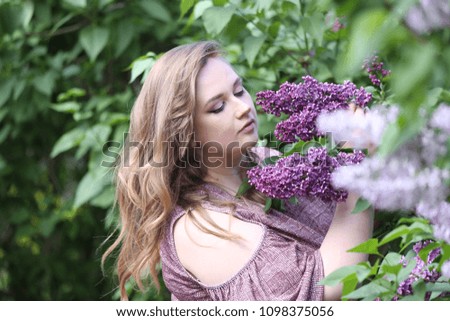girl in blooming lilac