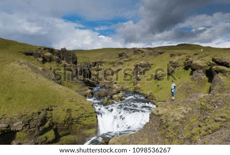 Beautiful landscape in Iceland. Man in standing on the rock