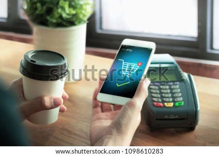 Mockup image of hands cafe making show shopping transfer payment through smartphone app Mobile Payment with NFC technology