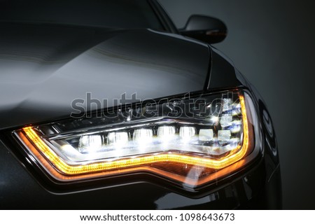headlight of  modern prestigious car closeup Royalty-Free Stock Photo #1098643673