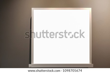 White Empty Frame On The Gray Wall.Blank Advertisement Banner Poster Mock Up Isolated Template Clipping Path