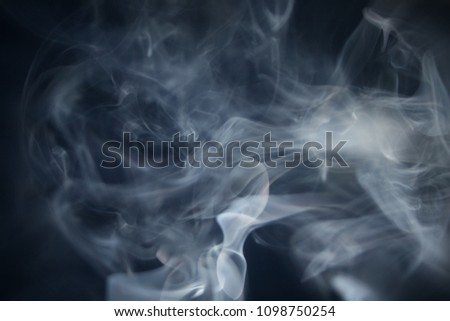 A thick blue tinted smoke texture/overlay over a black background. 