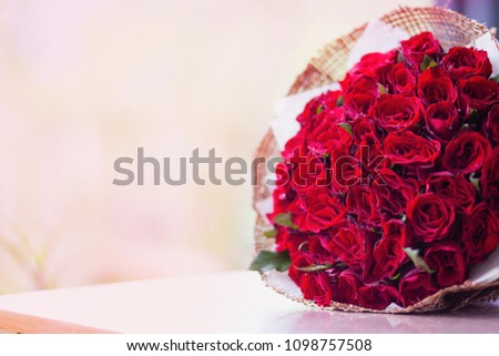 Bouquet of roses on the space for text input.