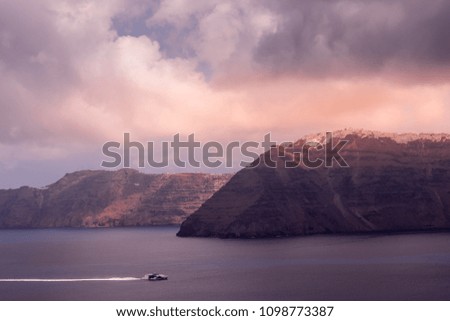 The Golden Hour moment. The shot is taken at Greece from the place where we see Volcano . The scene and the color in the sky is simply memorable. Love the shades and the mountain shinning on the top.