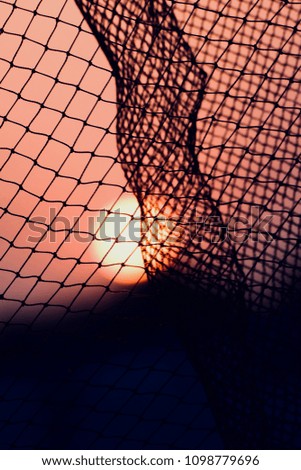 A curvy nylon nets pattern isolated object with sunlight background unique photo