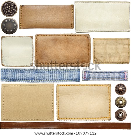 Blank leather jeans labels, buttons, straps isolated on white background