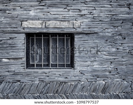One window on old wall of some old house, minimal style picture for background or interior design issue.