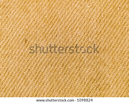 Stock macro photo of the texture of tan fabric.  Useful for layer masks and abstract backgrounds.