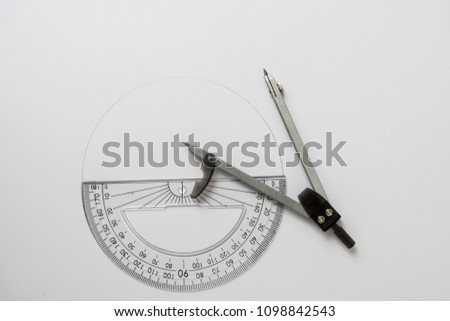 Circle with painted line and protractor on white background