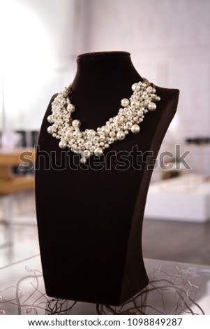 a fake pearl bunch necklace in jewelry store set used for shooting a movie