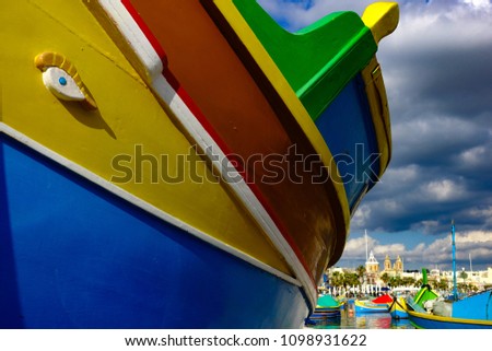 Colorful maltese boat, close up picture from the eye.