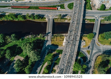 Aerial view on road full of running people during city marathon Riga, Latvia 