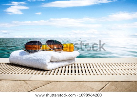 Summer photo of sunglasses and beach landscape 