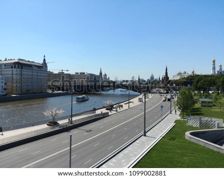 View on russian moscow (kremlin) embankment from bridge in the park