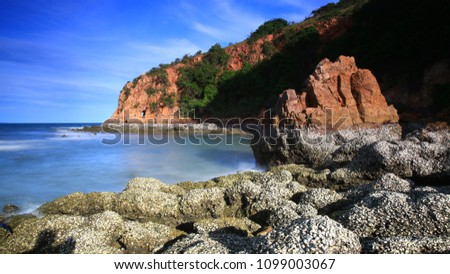 Sea coast at Laem Chabang ,Thailand  Royalty-Free Stock Photo #1099003067