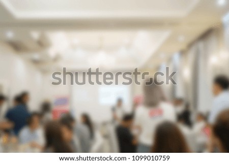 Abstract Blurred Business presentation in a Conference room, View from behind the audience on business seminar.