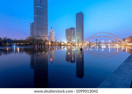 The colorful building is reflected in the water