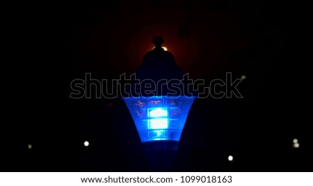 Beautiful blue street lights of a city area isolated unique object photograph