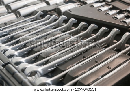 Sockets, tools, wrenches, spanners and bits in a chrome vanadium socket set.