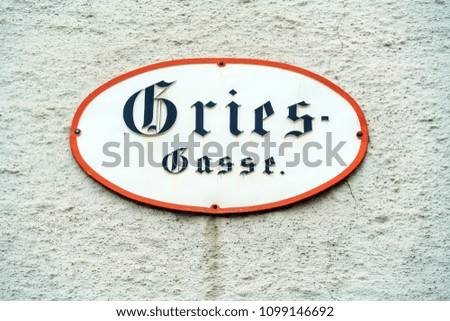 Vintage sign of old city street Griessgasse, Salzburg, Austria 