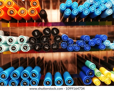 Close up image of the color of the pen on the shelf in the shop.