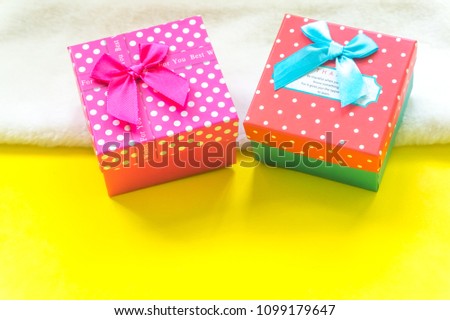 gift boxes on yellow background