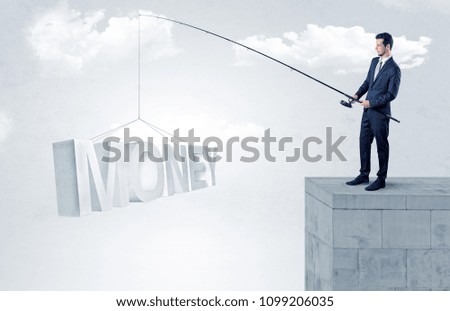 Young businessman fishing money, income from the top of a building