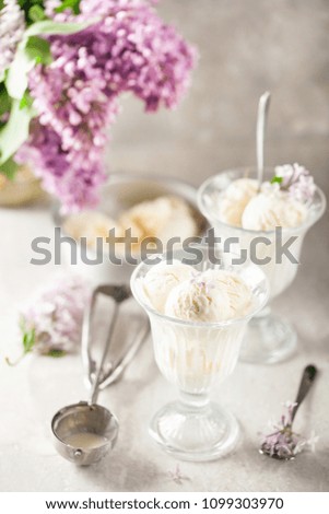 Ice cream in a bowl on a light background.