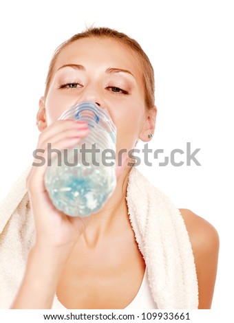 Woman in sportswear with bottle of water, isolated on white