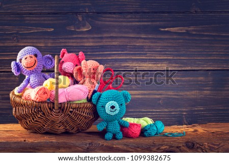 Amigurumi toys on a wooden background