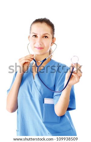 Smiling doctor in white coat using stethoscope isolated on white background
