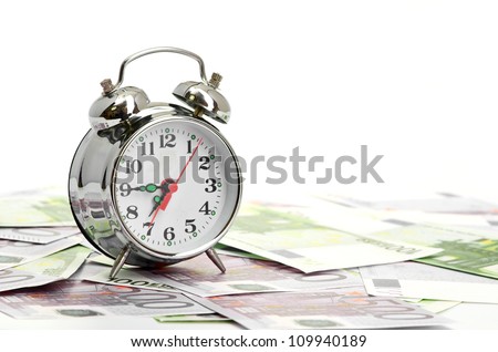 Alarm clock for euro banknotes isolated on white