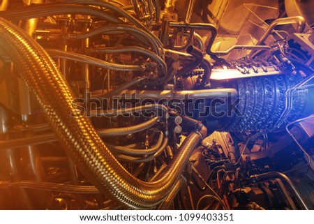 Gas turbine engine of feed gas compressor located inside pressurized enclosure, The gas turbine engine used in offshore oil and gas central processing platform.