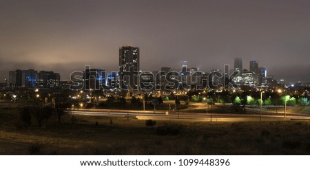 Denver skyline in fog at night