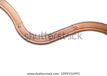 Wooden tracks isolated on white background. Construction of tracks with curves.
