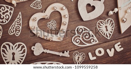 hearts on a wooden background. Lock and key. free space. Card. Love. banner