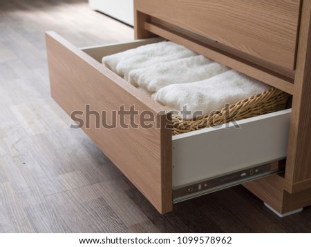 pull open drawer wooden in cabinet