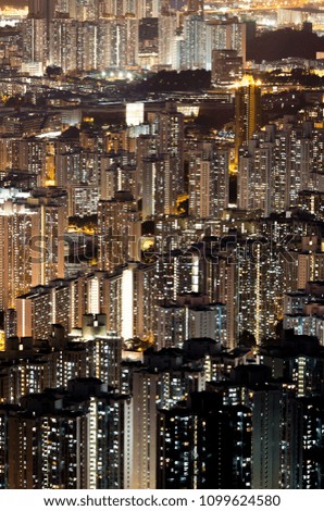 Urban cityscape skyline at night in Hong Kong 