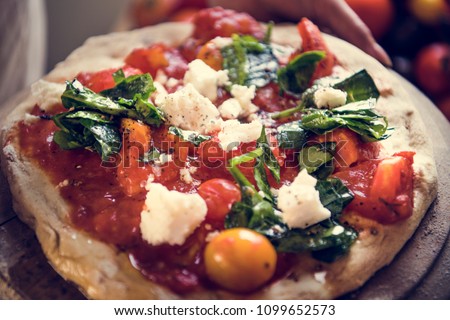 Homemade pizza food photography recipe idea Royalty-Free Stock Photo #1099652573