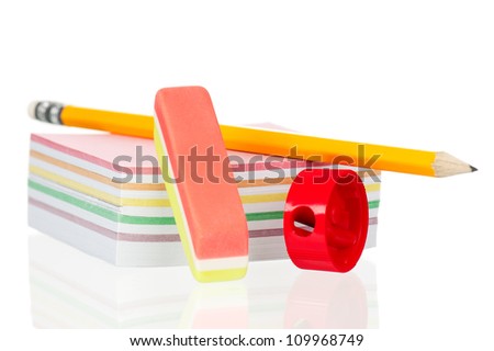Note paper and pencil isolated on white background