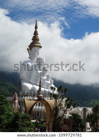 White Buddha, stacked on a mountain sky, is a beautiful cloud in Thailand.