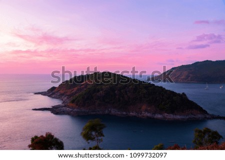 small tropical island with dramatic sky scenery view in phuket thailand.