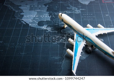 Passenger plane on the world map.Business transportation system concept