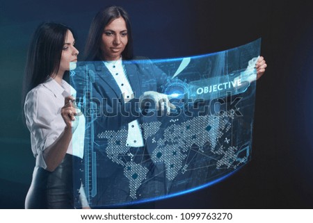 The concept of business, technology, the Internet and the network. A team of business women working on the virtual screen of the future and see the inscription: Objective