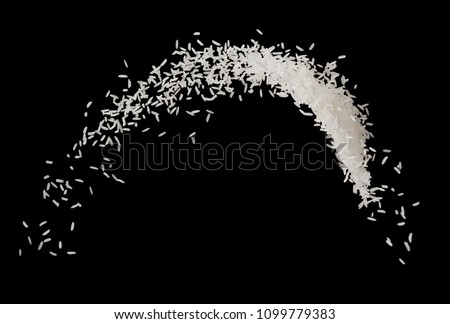 Stop motion white rice splash or explode flying in the air  isolated on black background food object design Royalty-Free Stock Photo #1099779383